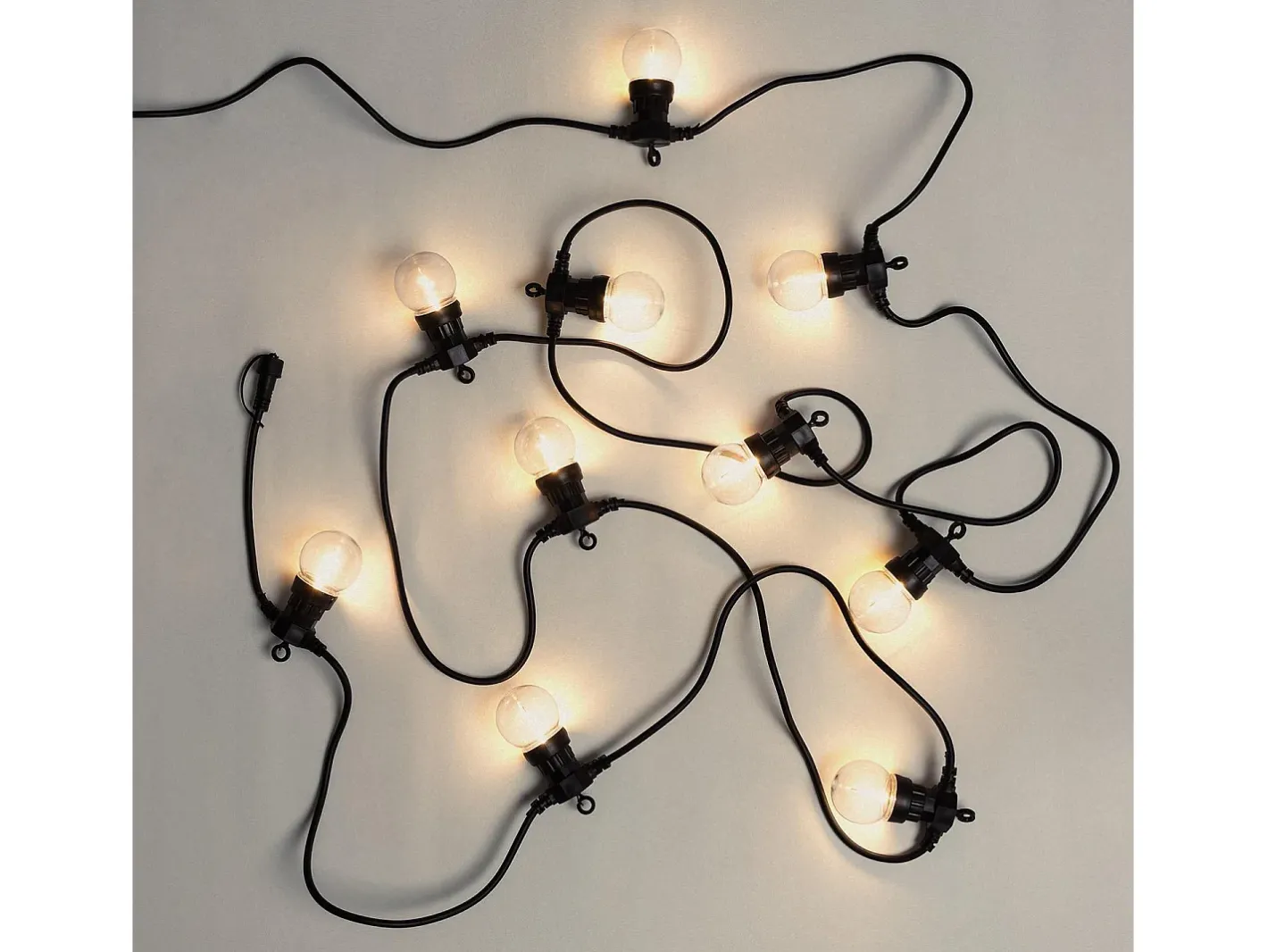 Ledkia Guirnalda Luminosa-Guirnalda Luces Exterior Easyfit 12VAC con 10 Bombillas 5.65m 2700K Blanco Cálido Negro